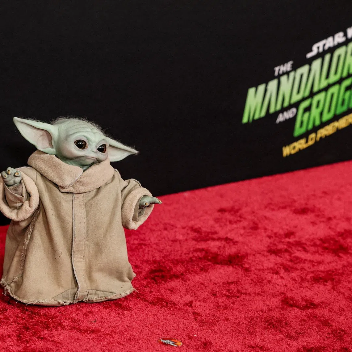 FILE PHOTO: Grogu attends a premiere for the film Star Wars: The Mandalorian and Grogu at TCL Chinese theatre in Los Angeles, California, U.S., May 14, 2026. REUTERS/Mario Anzuoni/File Photo