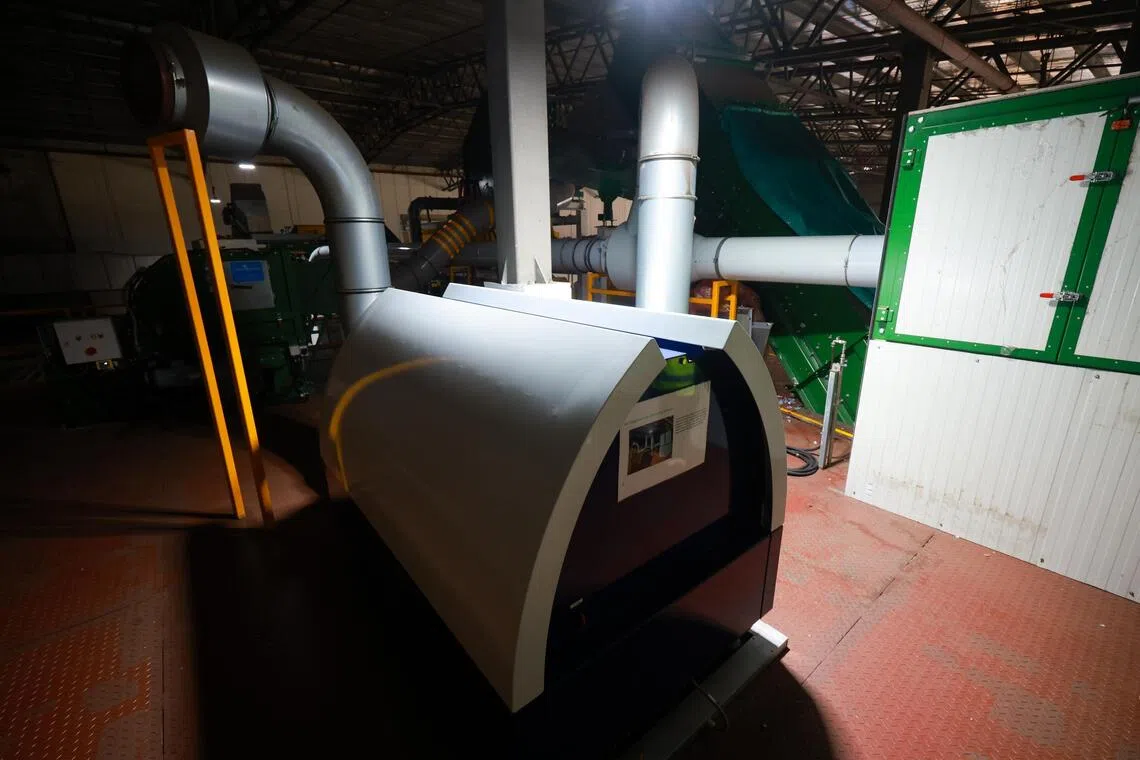 The air conveying system transports beverage containers through enclosed pipes.