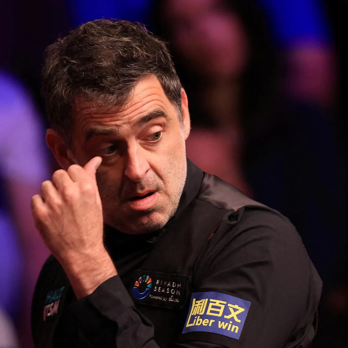 FILE PHOTO: Snooker - World Snooker Championship - The Crucible Theatre, Sheffield, Britain - May 2, 2025 England's Ronnie O'Sullivan reacts during his semi final match against China's Zhao Xintong Action Images via Reuters/Andrew Boyers/File Photo