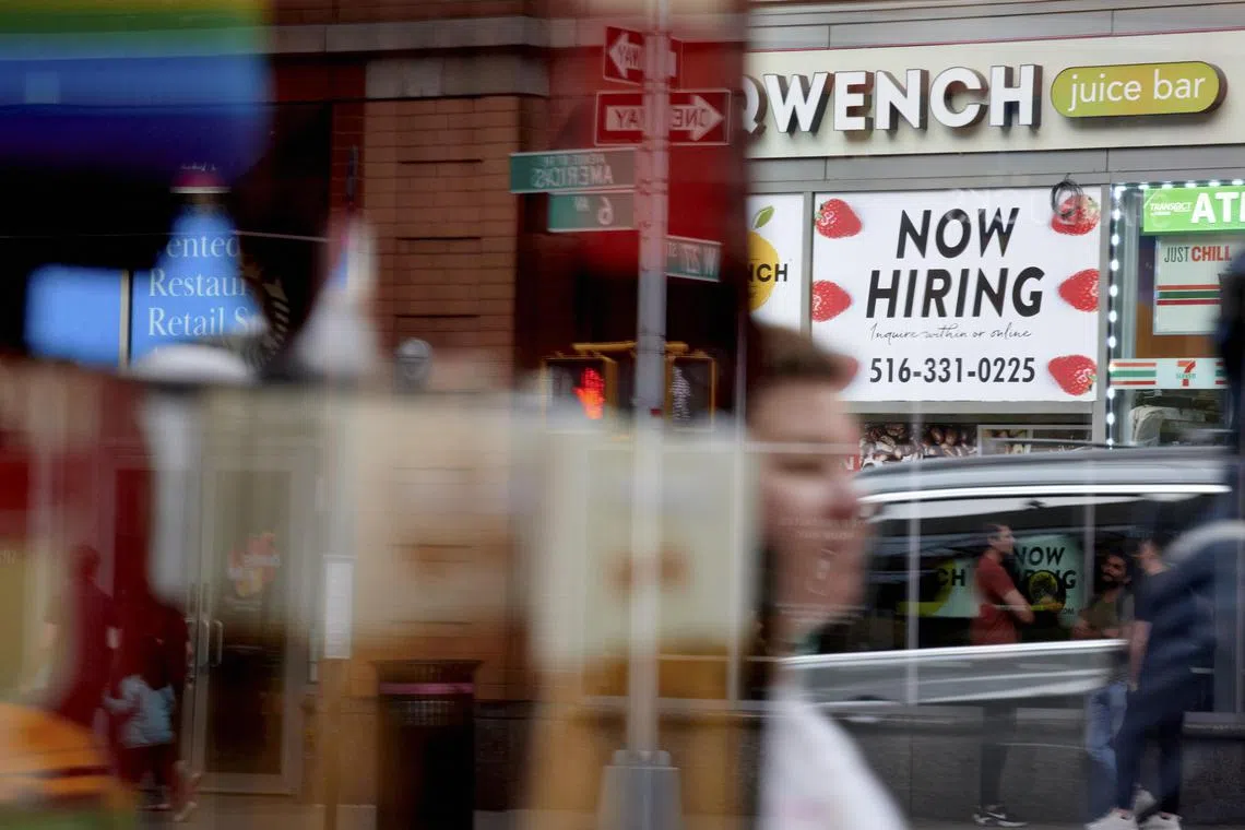A “now hiring” sign outside Quench Juice Bar in New York, on April 29, 2024. The Federal Reserve spent much of 2022 and 2023 narrowly focusing on inflation as policymakers set interest rates: Prices were rising way too fast, so they became the central bank’s top priority. But now that inflation has cooled, officials are more clearly factoring the job market into their decisions again. (Gabby Jones/The New York Times)