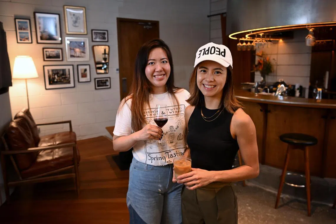 Wildcard co-owners Charlene Yeap (left) and Denise Lum photographed at their cafe-bar on June 12, 2023.

Feature on cafes that become bars at night
