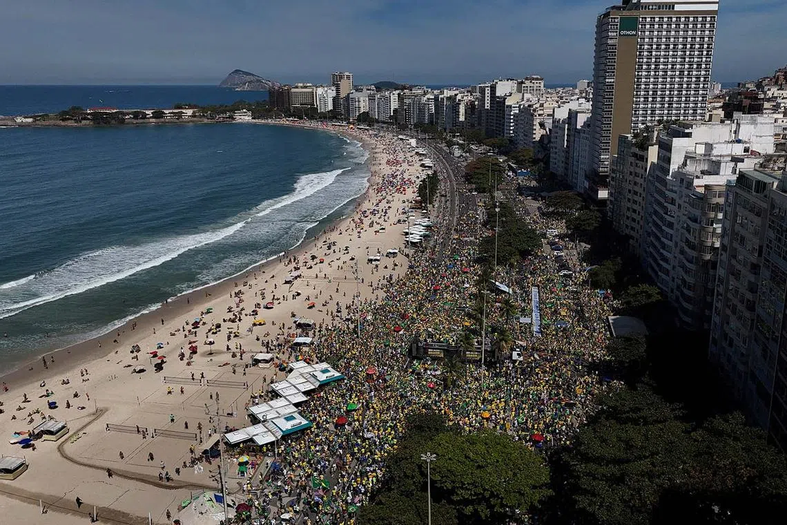 Supporters of former Brazilian President Jair Bolsonaro attending a demonstration, against the Brazil's Supreme Court's measures in Bolsonaro's trial, in Copacabana in Rio de Janeiro, Brazil, Aug 3, 2025. 