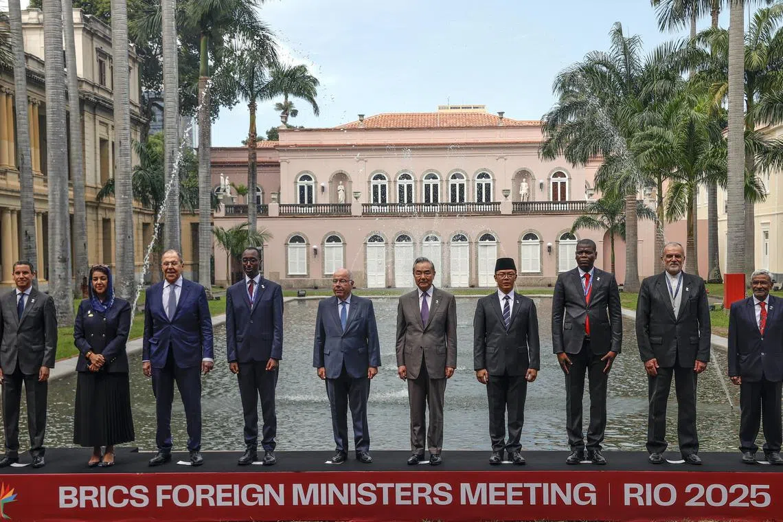 (From left) Egypt's Assistant Foreign Ministerr Ragui El-Etreby, UAE Minister of State for International Cooperation Reem Al Hashimy, Russian Foreign Minister Sergey Lavrov, Ethiopian Foreign Minister Gedion Timothewos, Brazilian Foreign Minister Mauro Vieira, Chinese Foreign Minister Wang Yi, Indonesian Foreign Minister Sugiono, South African Minister of International Relations and Cooperation Ronald Lamola, Iranian Deputy Minister of Economic Diplomacy Sayed Rasool Mohajer, and Indian Secretary for Economic Relations Dammu Ravi pose for a photo during the Brics Foreign Ministers' meeting in Rio de Janeiro on April 28. 