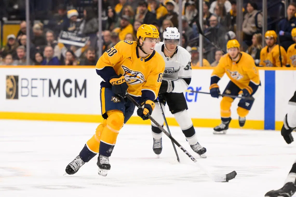 FILE PHOTO: Dec 21, 2024; Nashville, Tennessee, USA;  Nashville Predators left wing Zachary L'Heureux (68) skates with the puck against the Los Angeles Kings during the third period at Bridgestone Arena. Mandatory Credit: Steve Roberts-Imagn Images/File photo