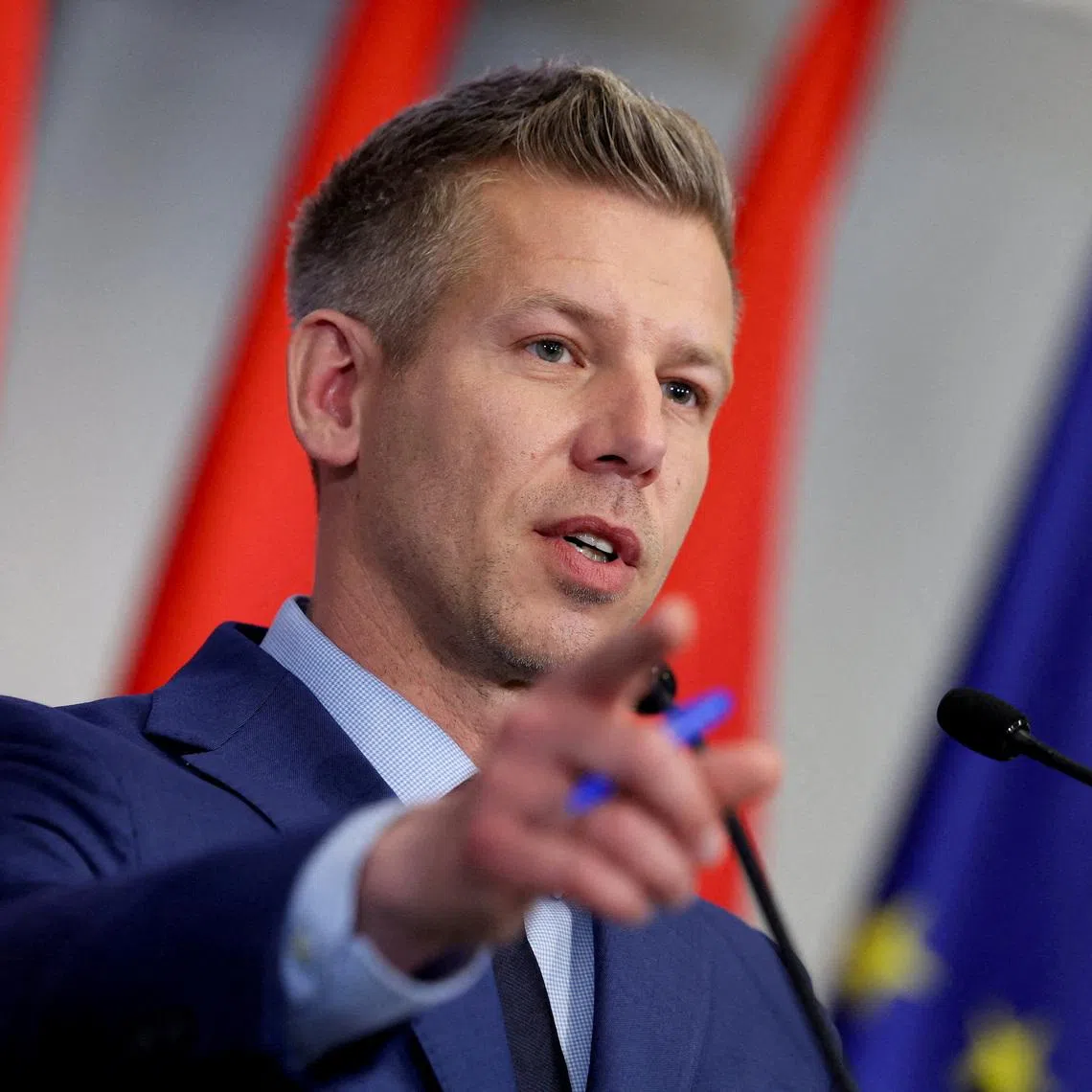 FILE PHOTO: Election winner Peter Magyar speaks during a press conference in Budapest, Hungary, April 20, 2026. REUTERS/Bernadett Szabo/File Photo