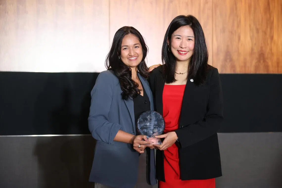 Travel editor Clara Lock (right) and journalist Sarah Stanley received the 'Travel Section of the Year' award at the inaugural TravMedia Awards Asia 2025 held on Oct 14.