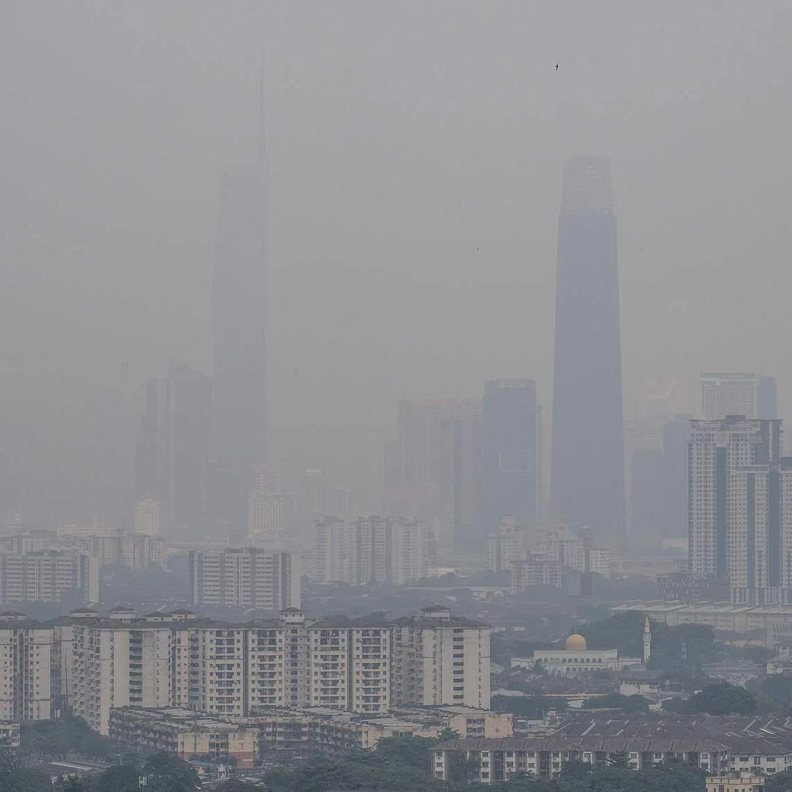 Haze shrouds the Kuala Lumpur skyline as seen from Ampang, in Malaysia’s Selangor state, on Sept 3.