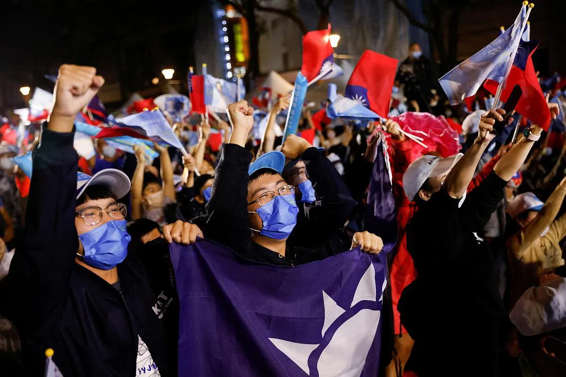 Supporters of the Kuomintang celebrating the preliminary results of the local elections in Taipei, Taiwan, on Nov 26, 2022.