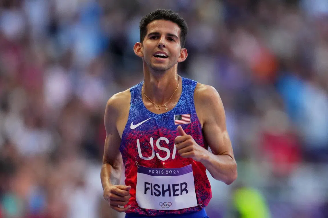 FILE PHOTO: Paris 2024 Olympics - Athletics - Men's 5000m Final - Stade de France, Saint-Denis, France - August 10, 2024.  Grant Fisher of United States reacts. REUTERS/Aleksandra Szmigiel/File Photo