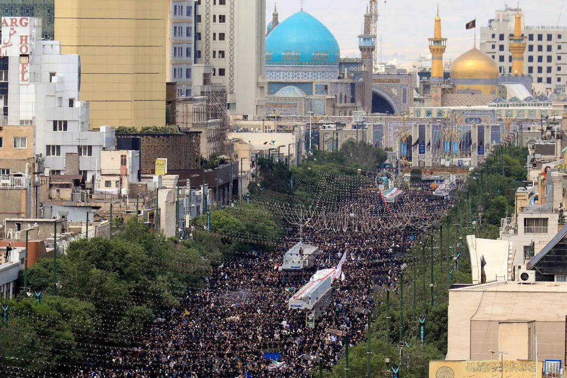 Mourners attend a burial ceremony of the late Iran's President Ebrahim Raisi in Mashhad, Iran, May 23, 2024. Iran's Presidency/WANA (West Asia News Agency)/Handout via REUTERS