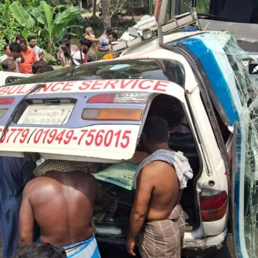 The ambulance was left mangled after colliding with the passenger bus head-on.