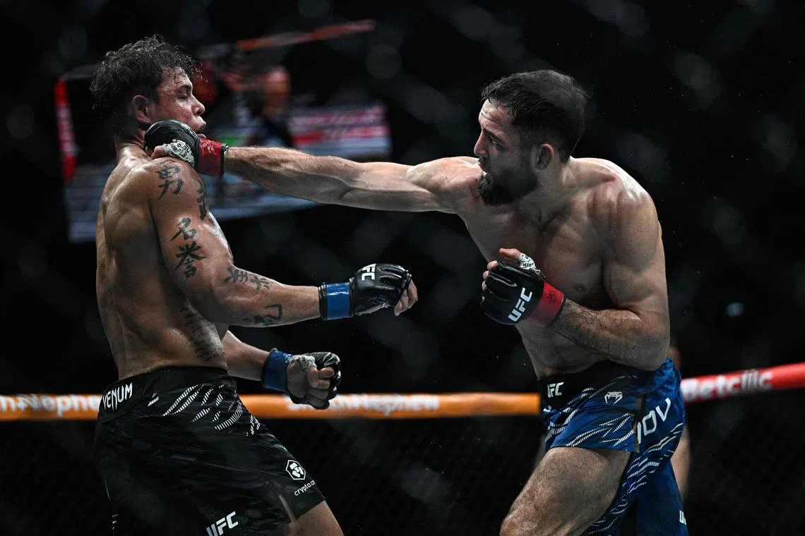 France's Nassourdine Imavov (right) punching Brazil's Caio Borralho during the the main event of UFC Fight Night at the Bercy Accor Arena in Paris on Sept 6 as he earned a unanimous decision – 50-45, 49-46, 49-46.