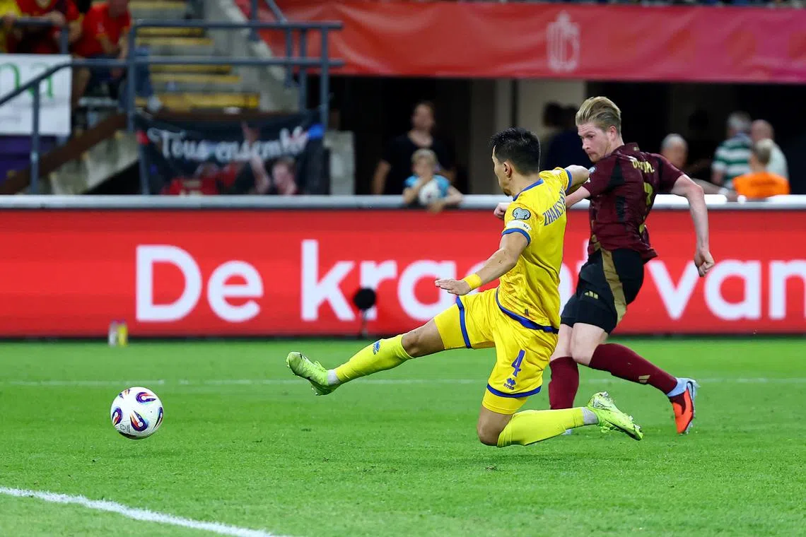 Soccer Football - World Cup - UEFA Qualifiers - Group J - Belgium v Kazakhstan - Lotto Park, Brussels, Belgium - September 7, 2025 Belgium's Kevin De Bruyne scores their fifth goal REUTERS/Yves Herman
