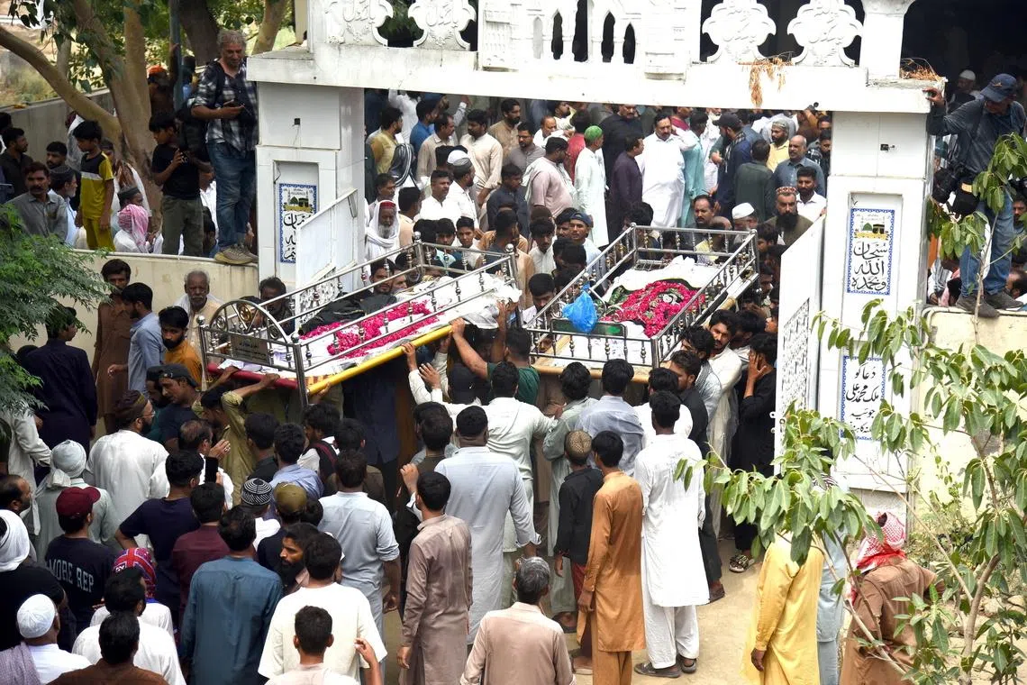 Mourners took part in funeral prayers at a local mosque on July 1 before the dead children were carried to the graveyard for burial.