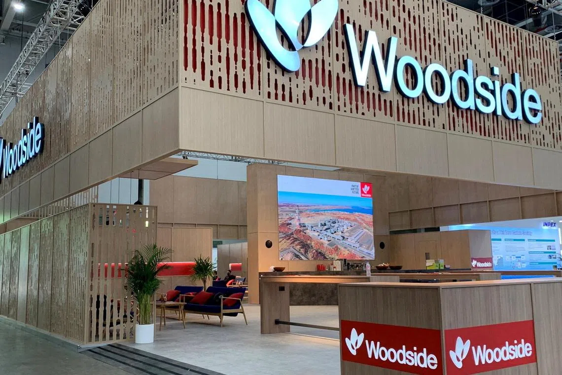 FILE PHOTO: Australia's Woodside Energy Group's exhibition booth is seen at the World Gas Conference 2022 in Daegu, South Korea May 23, 2022. REUTERS/Florence Tan/File Photo