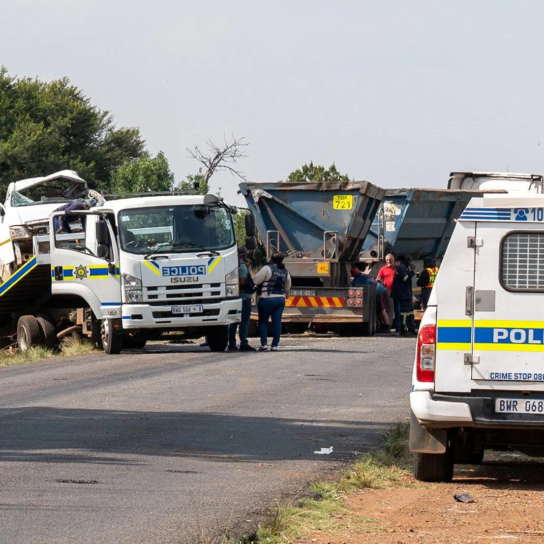 The scene of a fatal crash of 13 schoolchildren who perished ​when their minibus collided with a truck, in Johannesburg, South Africa, January 19, 2026. REUTERS/Shiraaz Mohamed