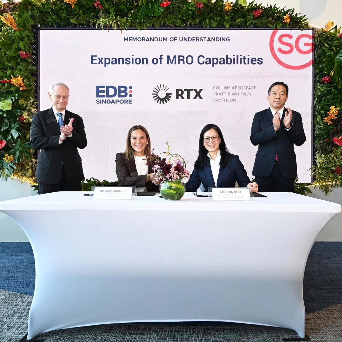 (From left) Mr Christopher Haave, vice-president of international operations and global government relations at RTX; Ms Irene Makris, president of power and controls at Collins Aerospace; Ms Cindy Koh, executive vice-president at the Economic Development Board (EDB); and Mr Png Cheong Boon, chairman of EDB, at the signing of an MOU on Feb 3.