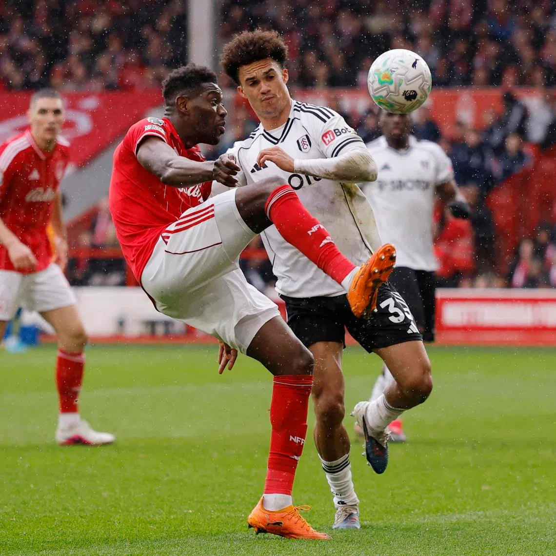 Soccer Football - Premier League - Nottingham Forest v Fulham - The City Ground, Nottingham, Britain - March 15, 2026 Nottingham Forest's Ibrahim Sangare in action with Fulham's Antonee Robinson Action Images via Reuters/Andrew Couldridge