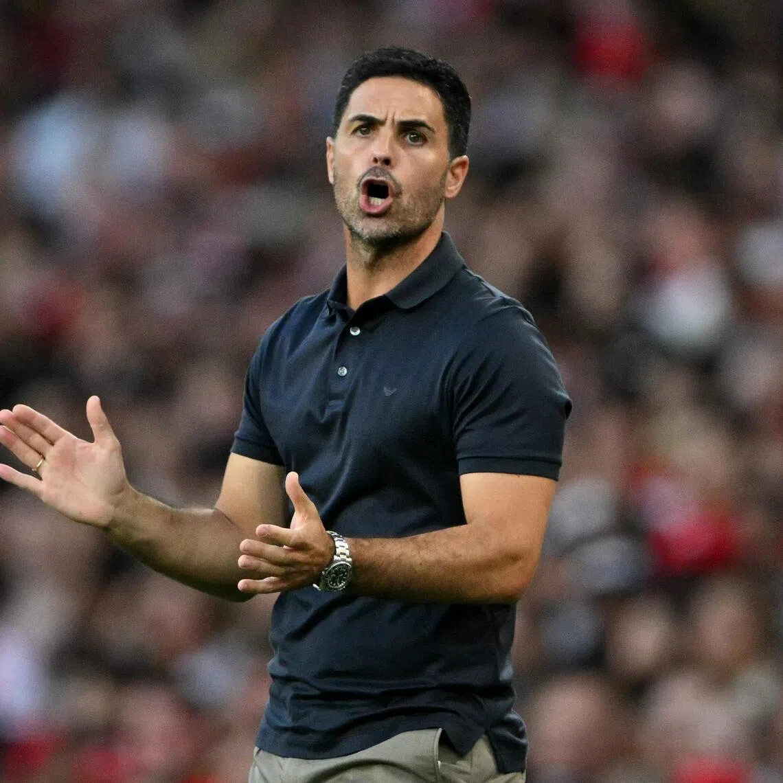 Arsenal’s Spanish manager Mikel Arteta reacts during the pre-season match between Arsenal and Como 1907 at the Emirates Stadium in London on Aug 8.