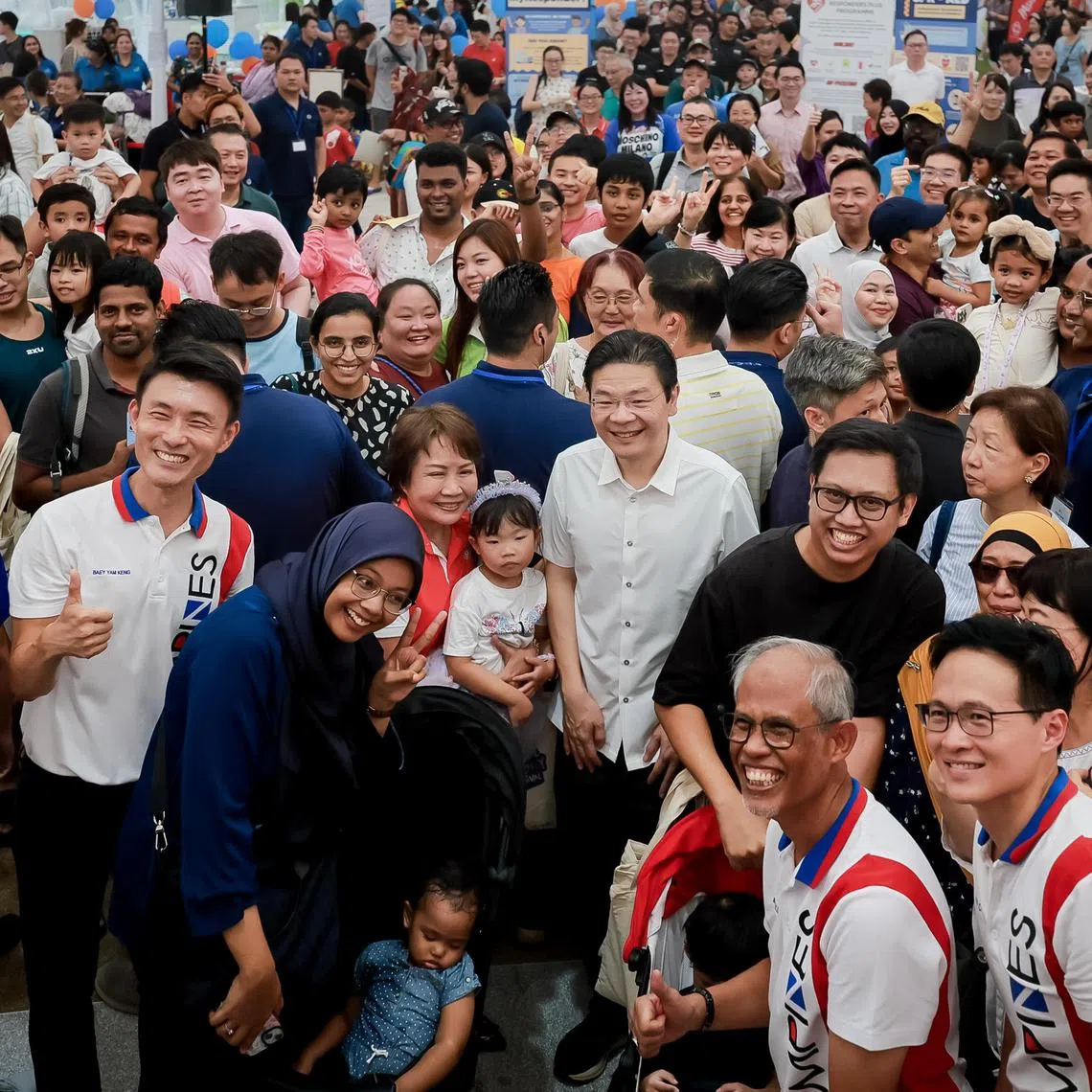 PM Lawrence Wong with residents at the Tampines Learning Festival 2024, held at Tampines Community Plaza on June 15.