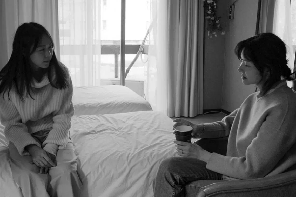 A still image from a film by South Korean director Hong Sang-soo, Hotel by the River.