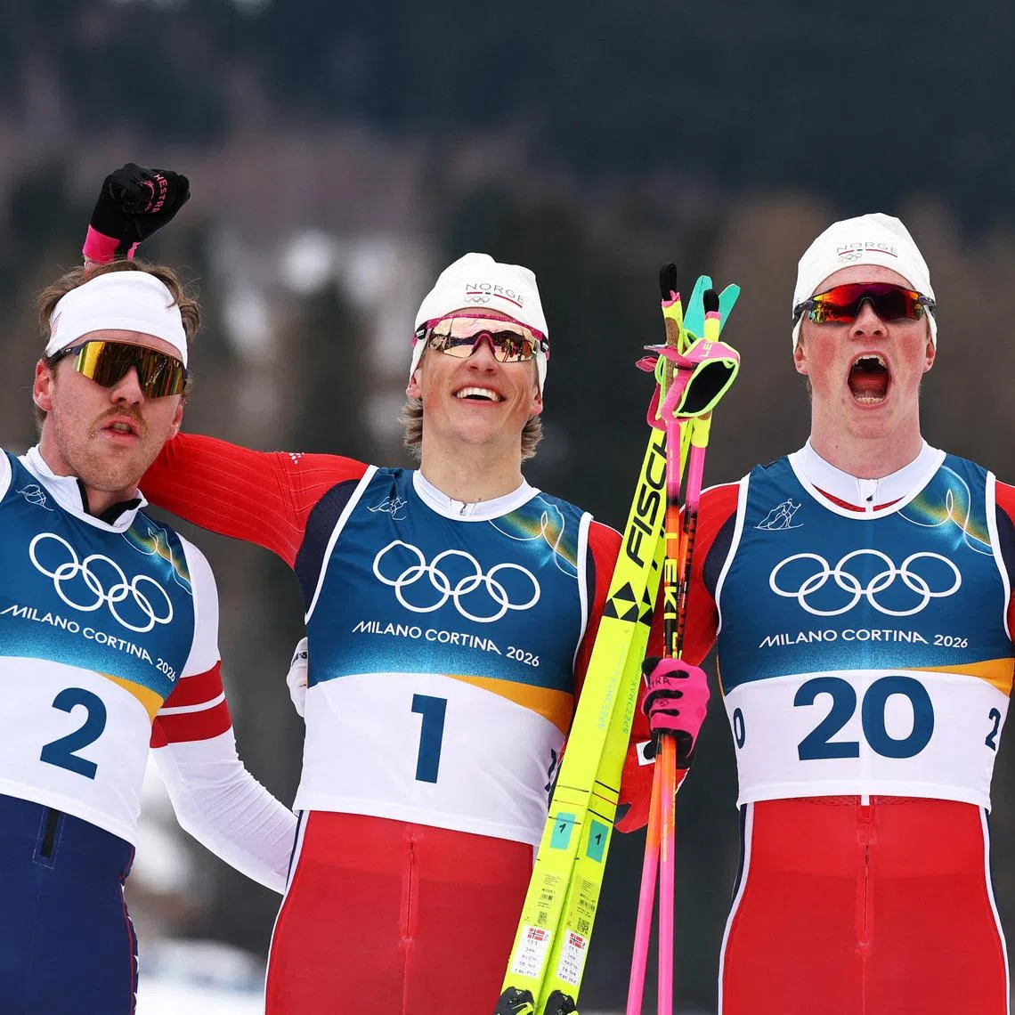 Milano Cortina 2026 Olympics - Cross-Country Skiing - Men's Sprint Classic Final - Tesero Cross-Country Skiing Stadium, Lago, Italy - February 10, 2026. Johannes Hoesflot Klaebo of Norway celebrates after winning the Men's Sprint Classic Final with second placed Ben Ogden of United States and third placed Oskar Opstad Vike of Norway REUTERS/Kai Pfaffenbach