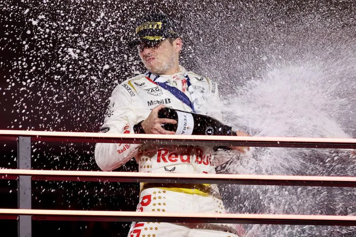 Formula One F1 - Las Vegas Grand Prix - Las Vegas Strip Circuit, Las Vegas, Nevada, U.S - November 18, 2023 First place Red Bull's Max Verstappen celebrates on the podium REUTERS/Mike Blake