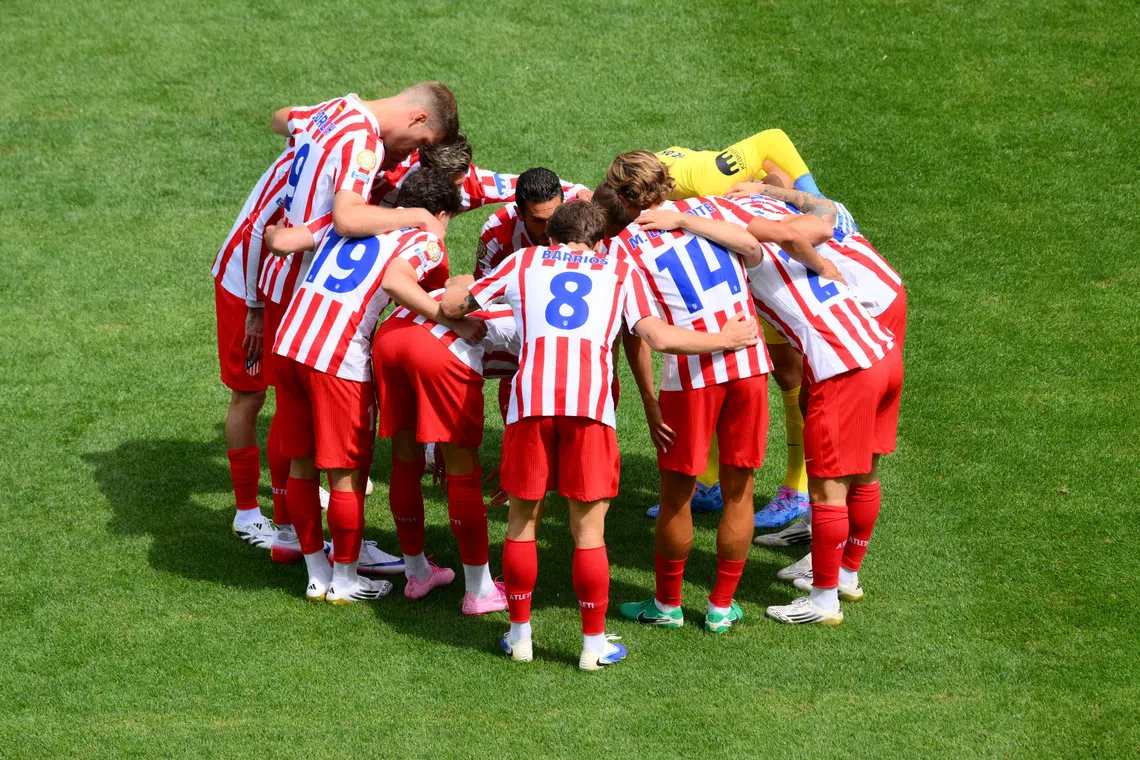 FILE PHOTO: Soccer Football - FIFA Club World Cup - Group B - Seattle Sounders v Atletico Madrid - Lumen Field, Seattle, Washington, U.S. - June 19, 2025  Atletico Madrid players huddle before the match IMAGN IMAGES via Reuters/Steven Bisig/File Photo