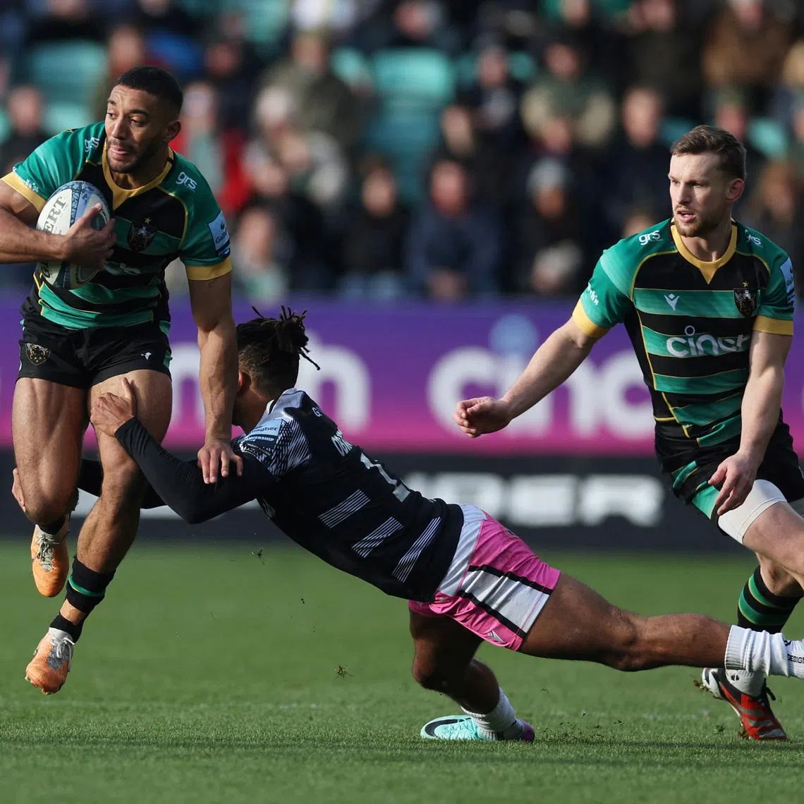 Rugby Union - Premiership - Northampton Saints v Newcastle Falcons - Franklin's Gardens, Northampton, Britain - January 27, 2024 Northampton Saint's Gabriel Hamer-Webb in action with Newcastle Falcon's Elliott Obatoyinbon. Action Images/Paul Childs