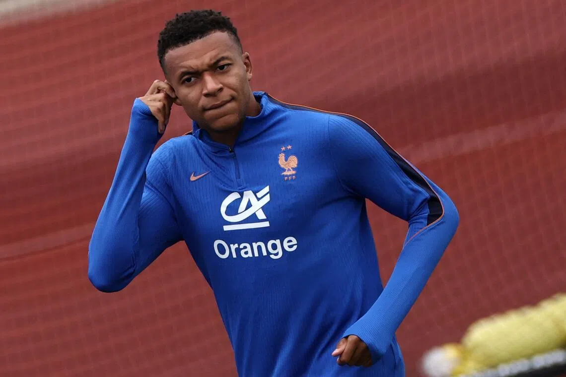 France's forward #10 Kylian Mbappe attends a training session at Bentley University in Waltham, near Boston, on July 07, 2026, during the 2026 World Cup football tournament. (Photo by FRANCK FIFE / AFP)