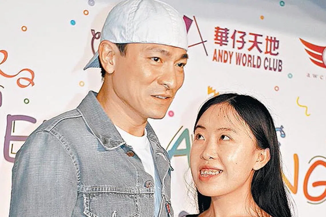 Hong Kong actor Andy Lau with infamous Chinese fan Yang Lijuan on March 25, 2007.