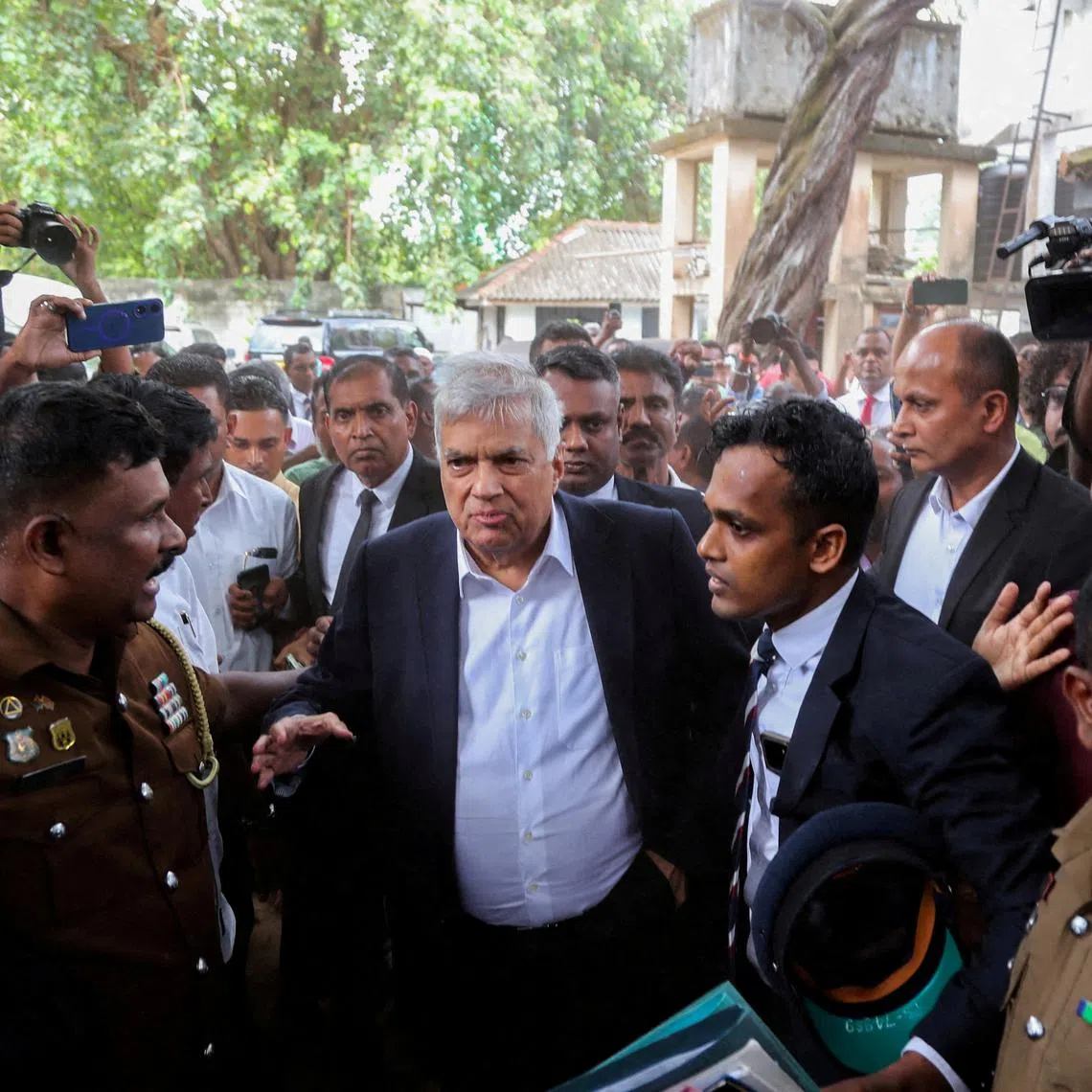 FILE PHOTO: Sri Lanka's former President Ranil Wickremesinghe arrives at the Magistrate’s Court in Colombo, Sri Lanka, August 22, 2025. REUTERS/Lahiru Harshana/File Photo
