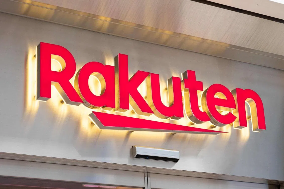This picture taken on November 7, 2022 shows signage for a shop of Japanese e-commerce firm Rakuten in Tokyo. - Rakuten are expected to announce their second quarter results on November 11. (Photo by Yuichi YAMAZAKI / AFP)