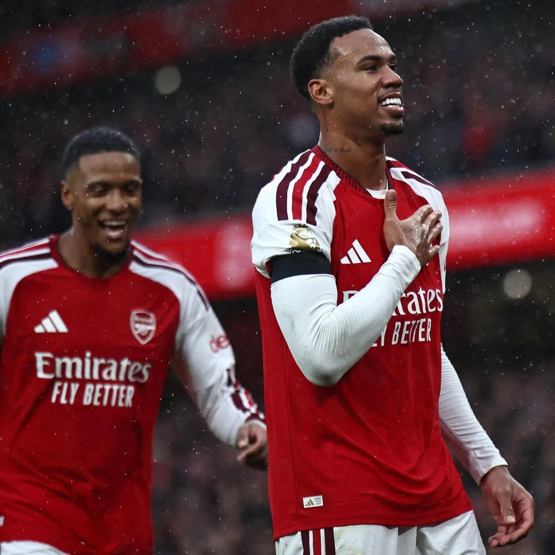 Arsenal’s Gabriel Magalhaes (right) celebrates scoring the Gunners’ second goal against Everton with Ezri Konsa, who scored their first.