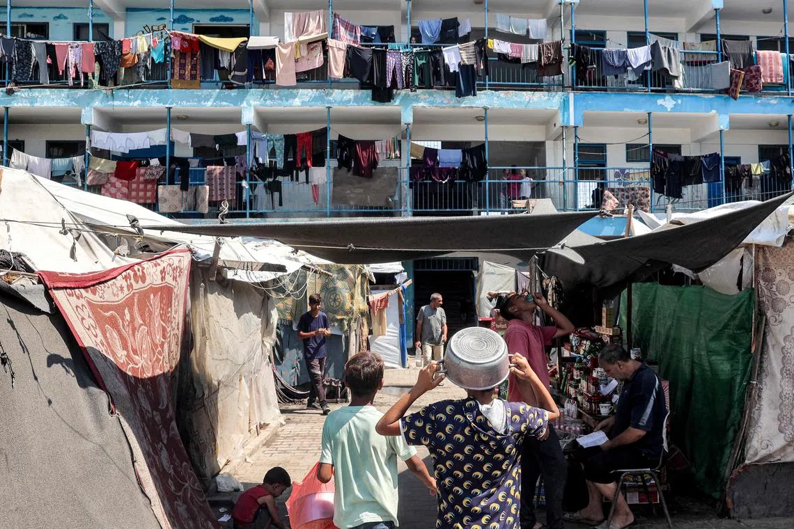 A make-shift camp for people displaced by conflict at a school run by the UNRWA in Deir el-Balah in the central Gaza Strip on Sep 9, 2024 amid the ongoing war in the Palestinian territory between Israel and Hamas.