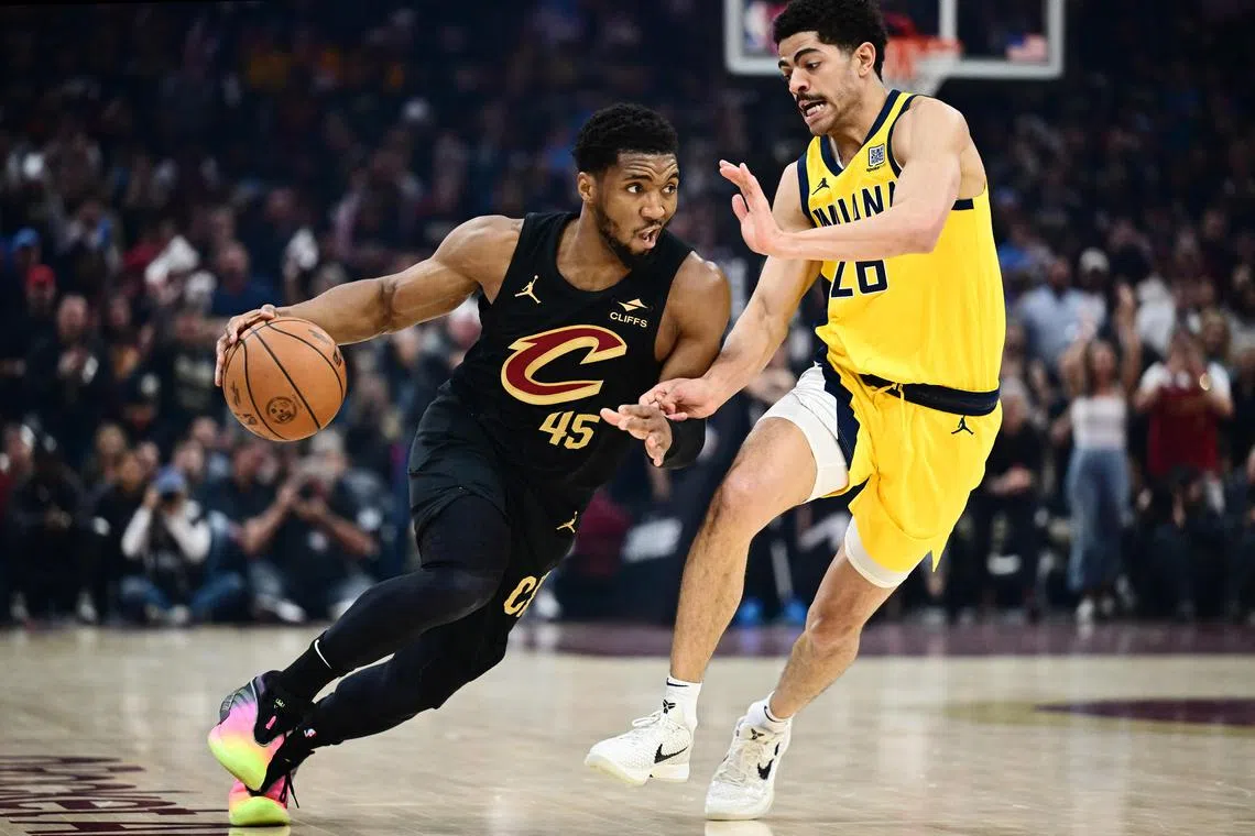 Cleveland Cavaliers guard Donovan Mitchell drives to the basket against Indiana Pacers guard Ben Sheppard during Game 5 of the second round of the NBA play-offs.