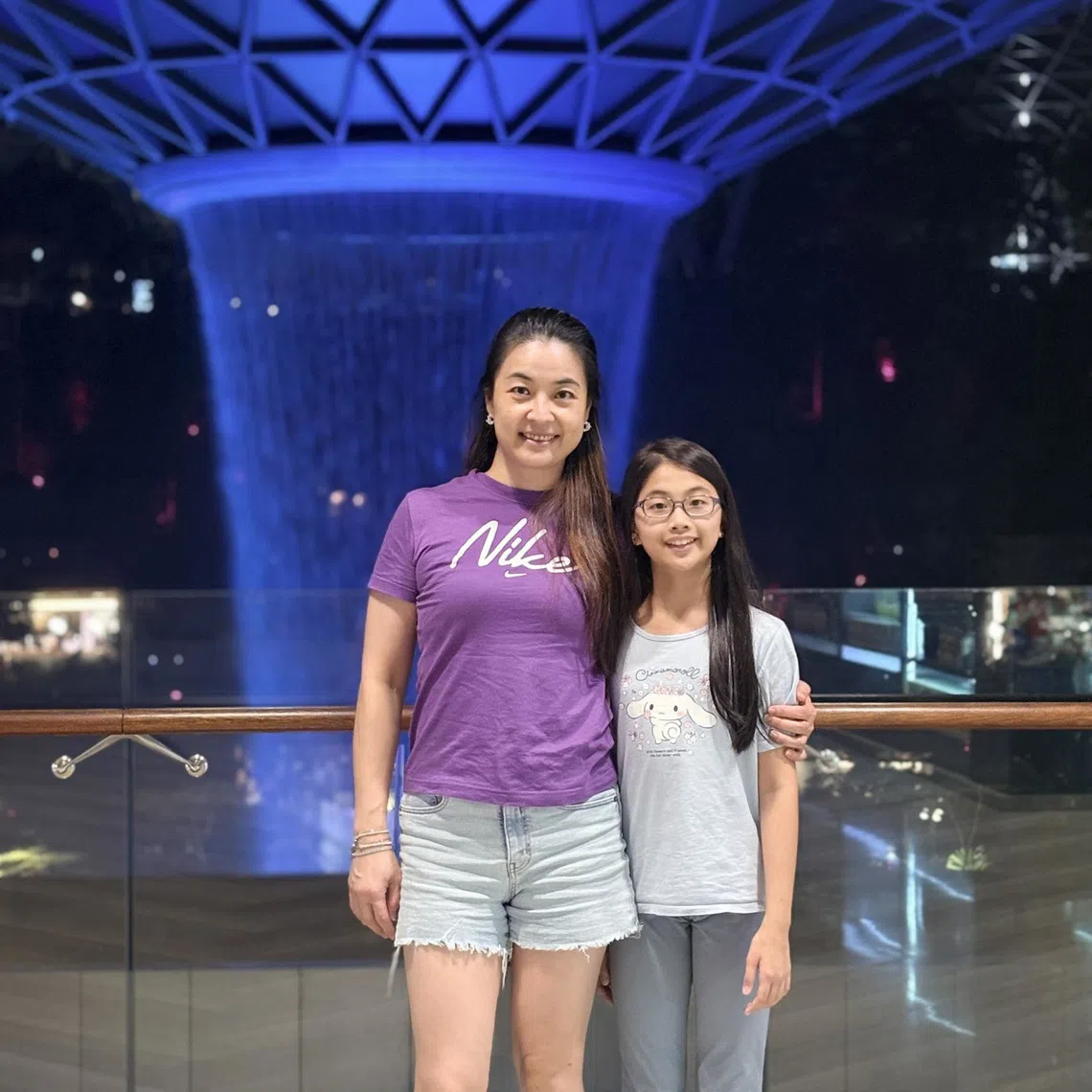 Grace Lio encourages her daughter Jodi to do what she wants, like marking her own practice papers and taking time for family bedtime conversations.