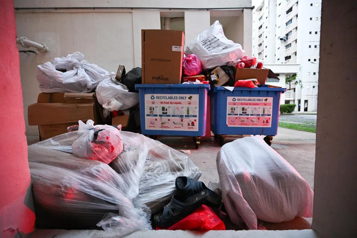 ST20240207-202425866695-Lim Yaohui-pixgeneric/
Generic photograph of cardboard boxes, recycling waste and rubbish placed at recycling bins below Blk 842 Tampines Street 82 on Feb 7, 2024.
Can be used for stories on environment, sustainability, trash, rubbish, waste, recycle and recycling.
(ST PHOTO: LIM YAOHUI)