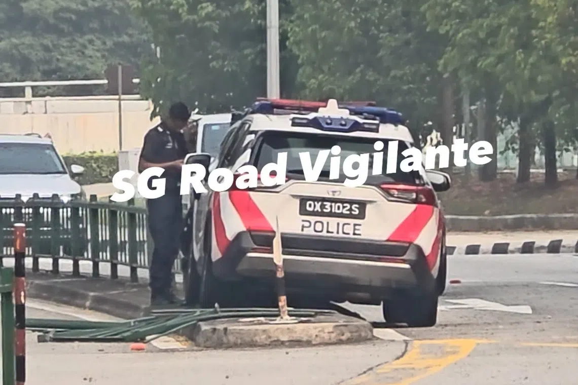 A police car mounted the kerb along Geylang Bahru Road and crashed into the green barrier that divides the road on Oct 10.