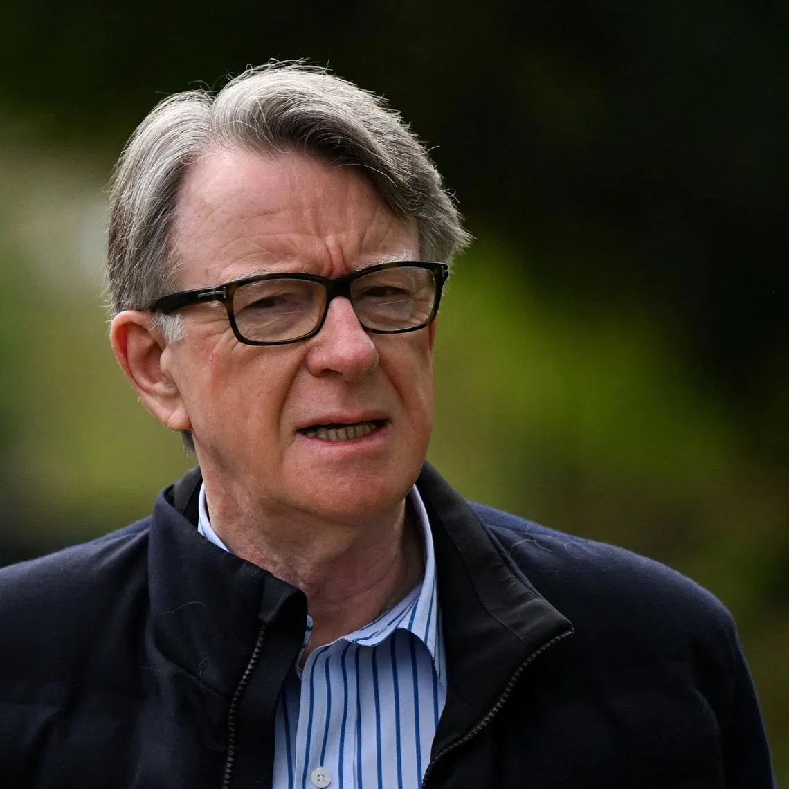 Former British ambassador to the U.S. Peter Mandelson walks outside his residence in London, Britain, April 17, 2026. REUTERS/Chris J Ratcliffe