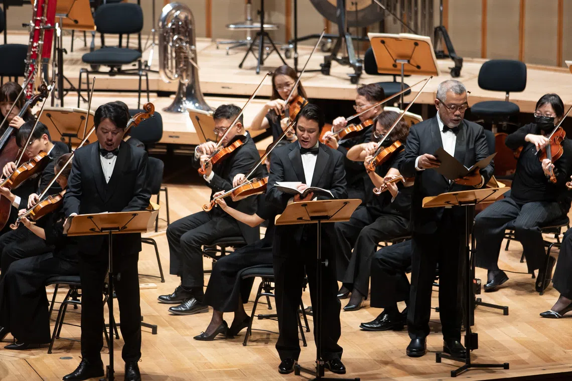 Soloists Jonathan Charles Tay, Leslie Tay and William Lim performing with the National Taiwan Symphony Orchestra.