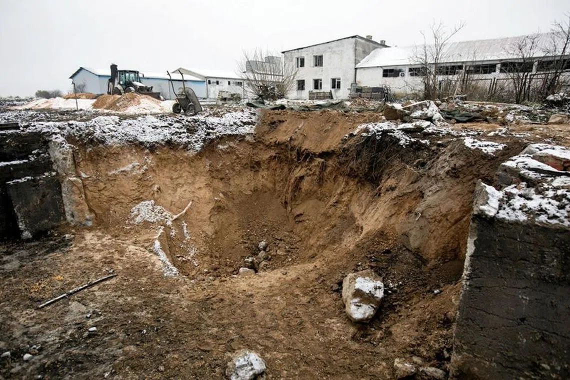 FILE PHOTO: A view of the destruction at the scene of a blast site at a grain drying facility in Przewodow, a village in southeastern Poland near the border with Ukraine, November 20, 2022. Jakub Orzechowski/Agencja Wyborcza.pl via REUTERS