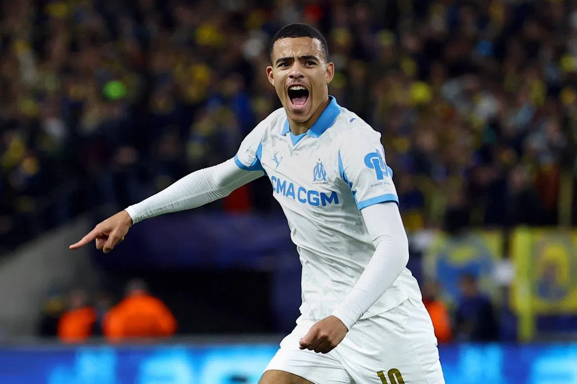 Soccer Football - UEFA Champions League - Union Saint-Gilloise v Olympique de Marseille - Stade Joseph Marien, Brussels, Belgium - December 9, 2025 Olympique de Marseille's Mason Greenwood celebrates scoring their second goal REUTERS/Yves Herman