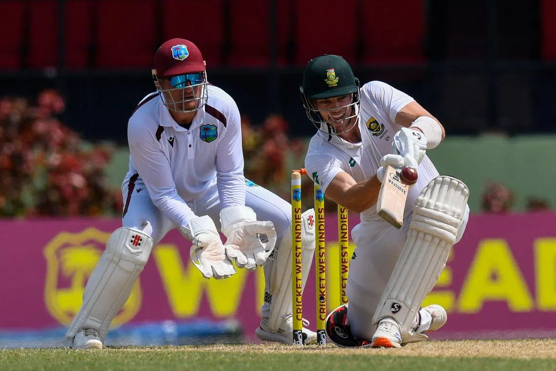 Tristan Stubbs of South Africa hits a four as West Indies wicket-keeper Joshua da Silva watches during day 2 of the 2nd cricket Test at Guyana National Stadium in Providence on Aug 16, 2024.