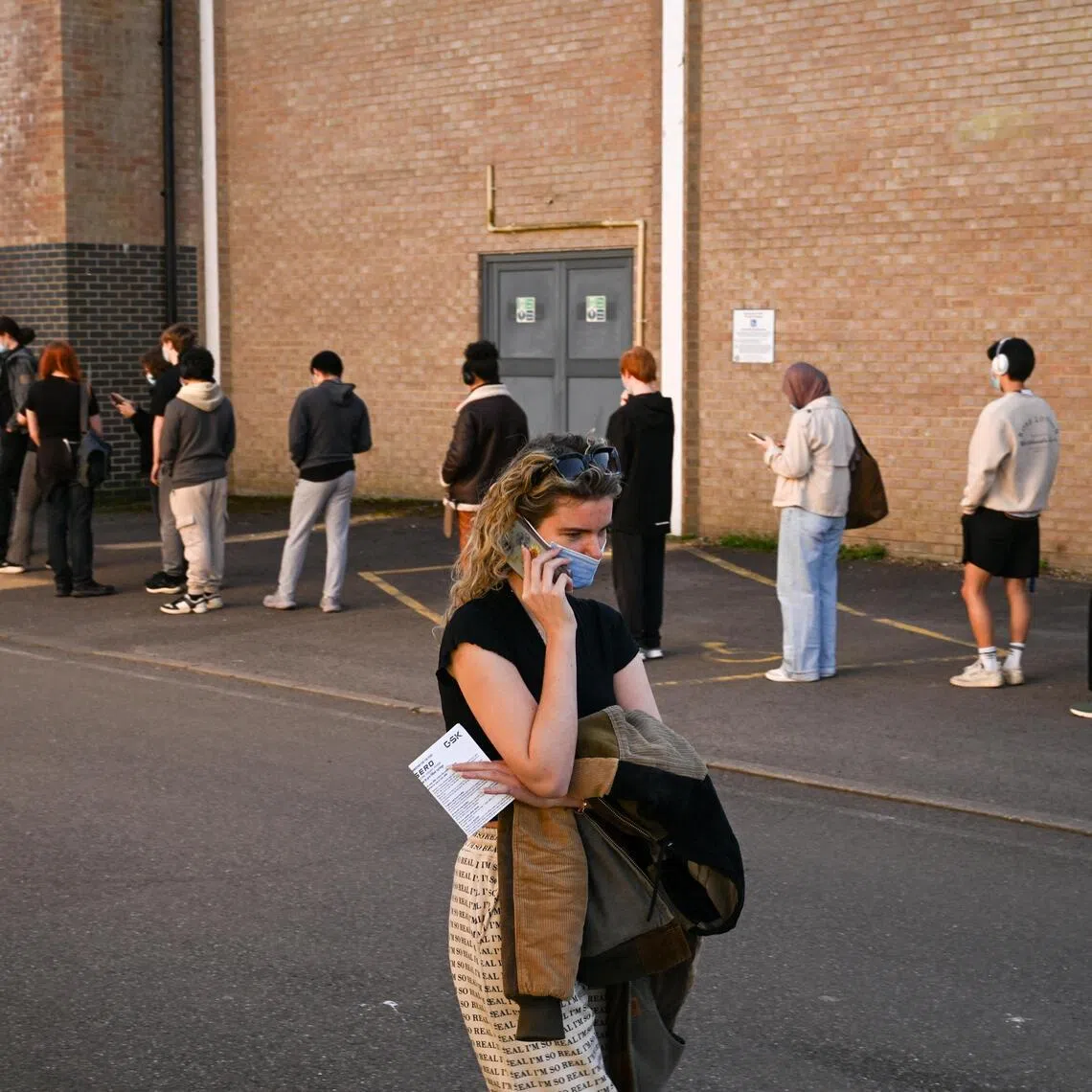 People queuing to receive vaccinations at the University of Kent campus on March 18, following an outbreak of meningitis.