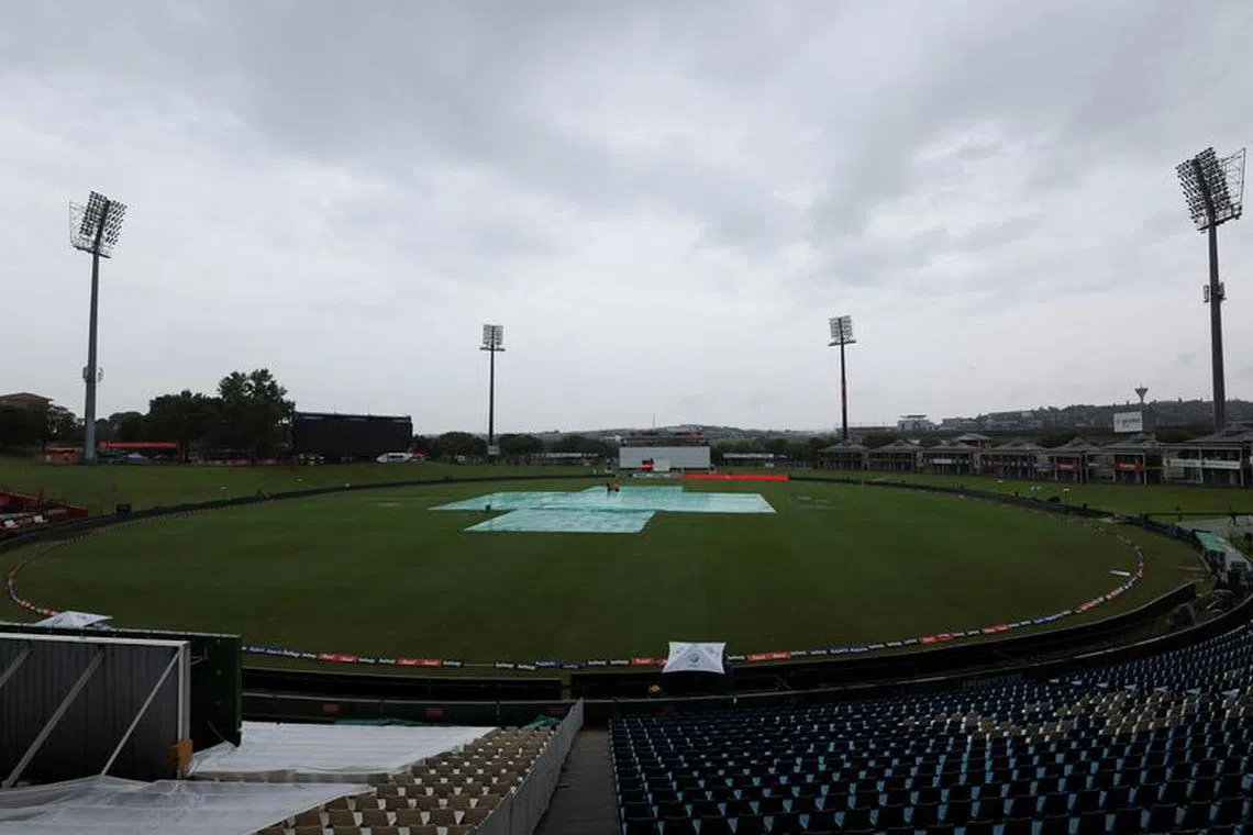 FILE PHOTO: The pitch and part of the ground is covered, during rain, a day before the first cricket test match between South Africa and India at SuperSport Park Cricket Stadium, in Centurion, South Africa, December 25, 2023. REUTERS/Esa Alexander/File Photo