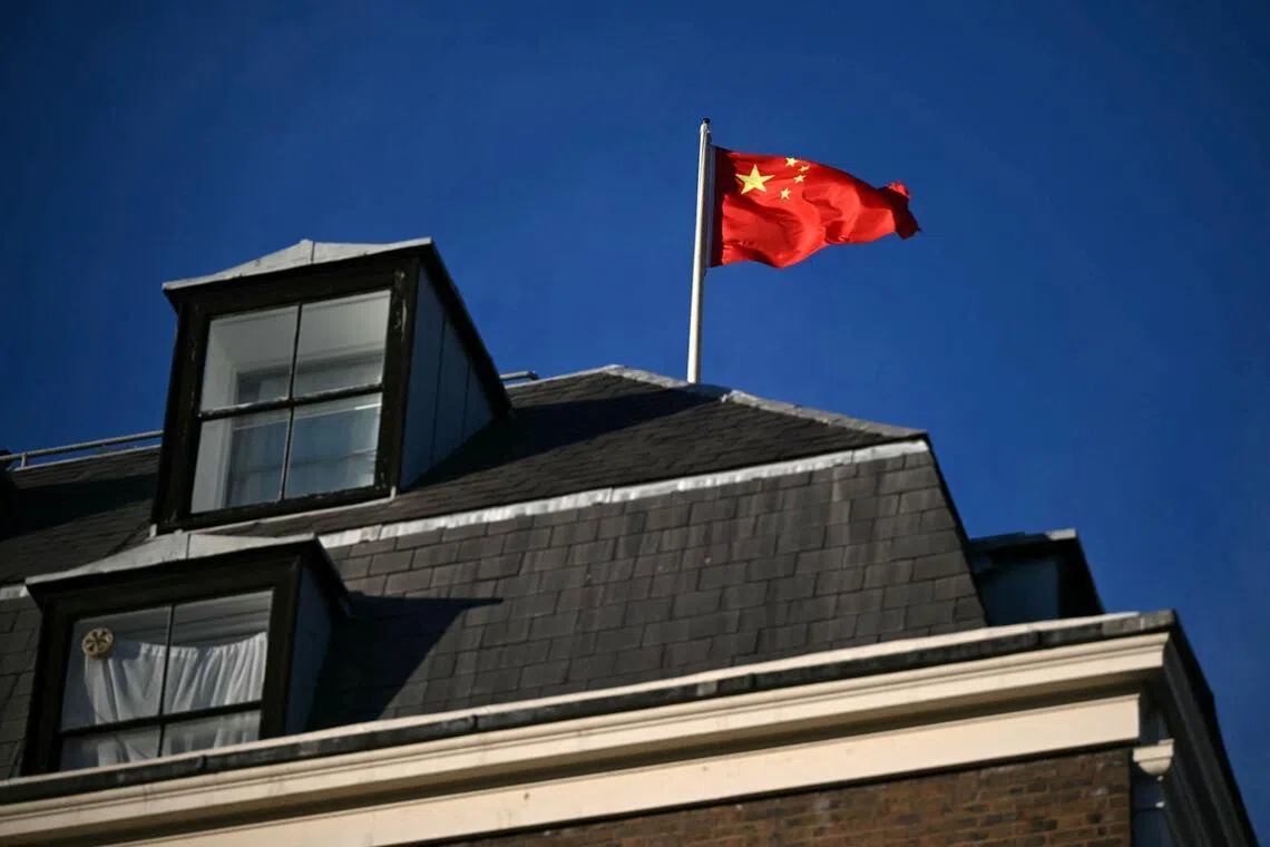 A flag flying on top of China's embassy in Portland Place, London. Two men were convicted on May 7 in Britain of spying on behalf of Hong Kong and ultimately China.