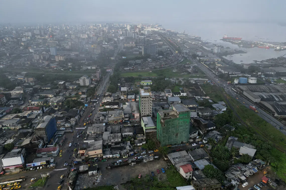 Motorcycle taxi drivers of Cameroon's Douala long for jobs and escape
