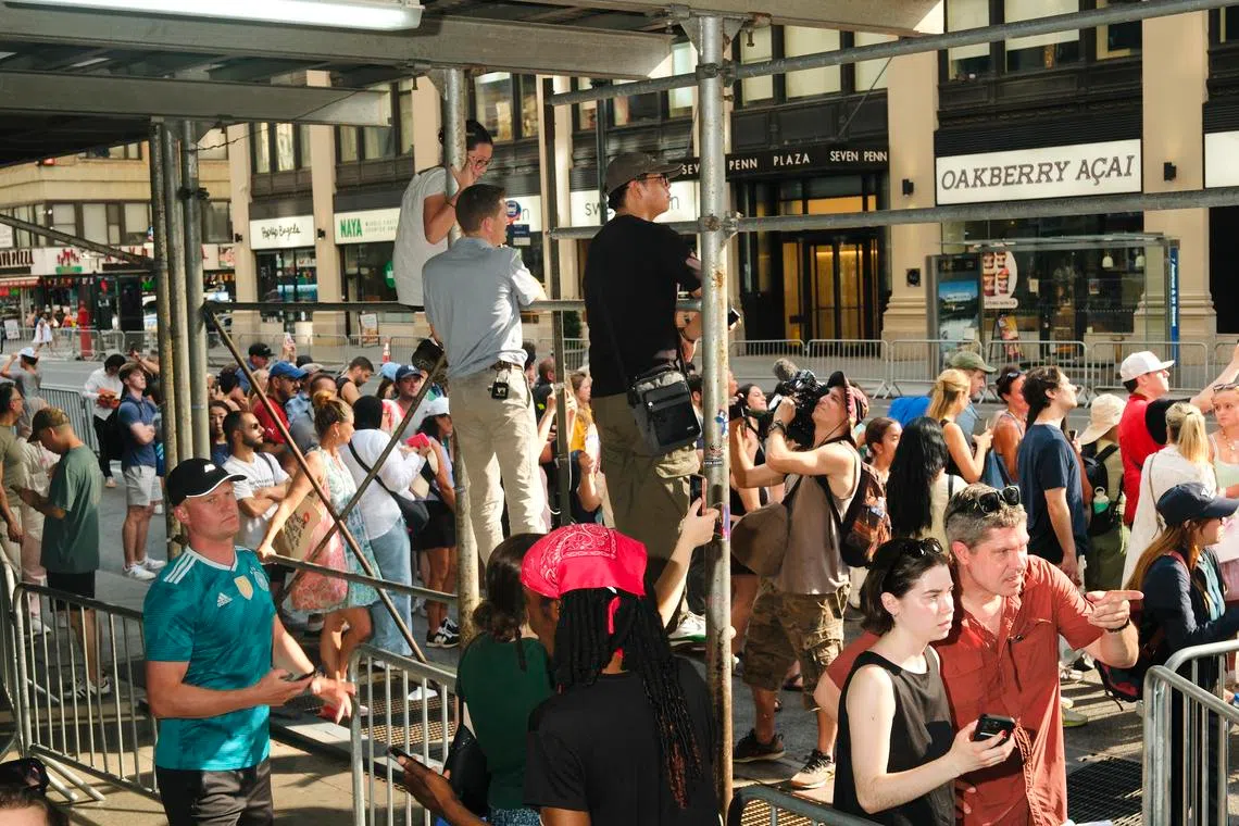 Fans and reporters near Madison Square Garden on July 3.