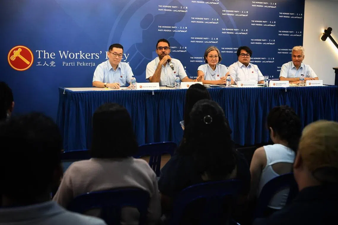 Workers' Party chief Pritam Singh and chairman Sylvia Lim (seated in centre) introducing new candidates (from left) Jasper Kuan, Sufyan Mikhail Putra Mohd Kamil and Harpreet Singh at the party's headquarters on April 19.